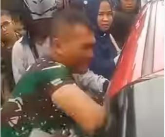Video Viral, Aksi Anggota TNI Selamatkan Bayi yang Terkunci di dalam Mobil