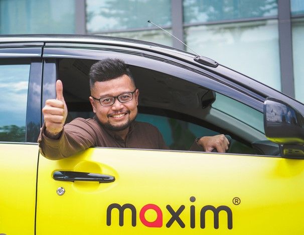 Maxim Tawarkan Dua Layanan, Solusi Transportasi Saat Musim Hujan