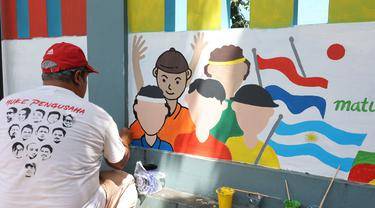Art Director Profesional Ady Laksono Sosok Penting Konsep Hias Kampung Bucin Piala Dunia 2022!